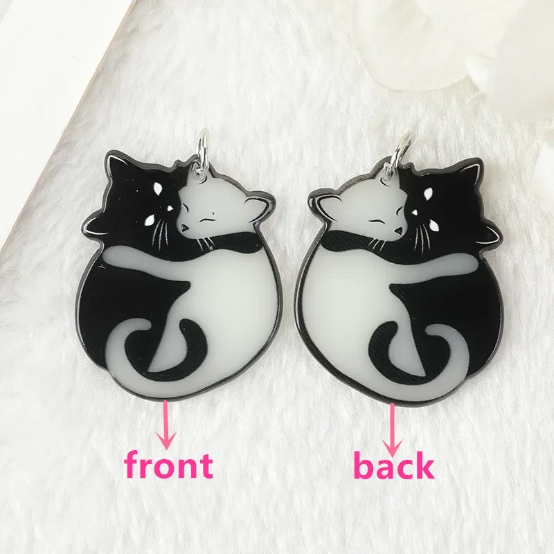 Glow in dark cat earrings